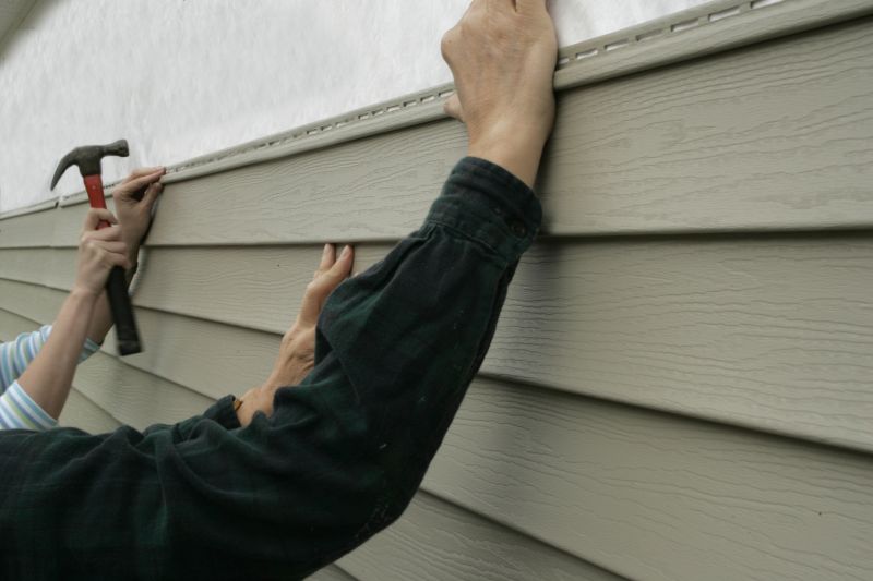Securing Vinyl Siding Panels